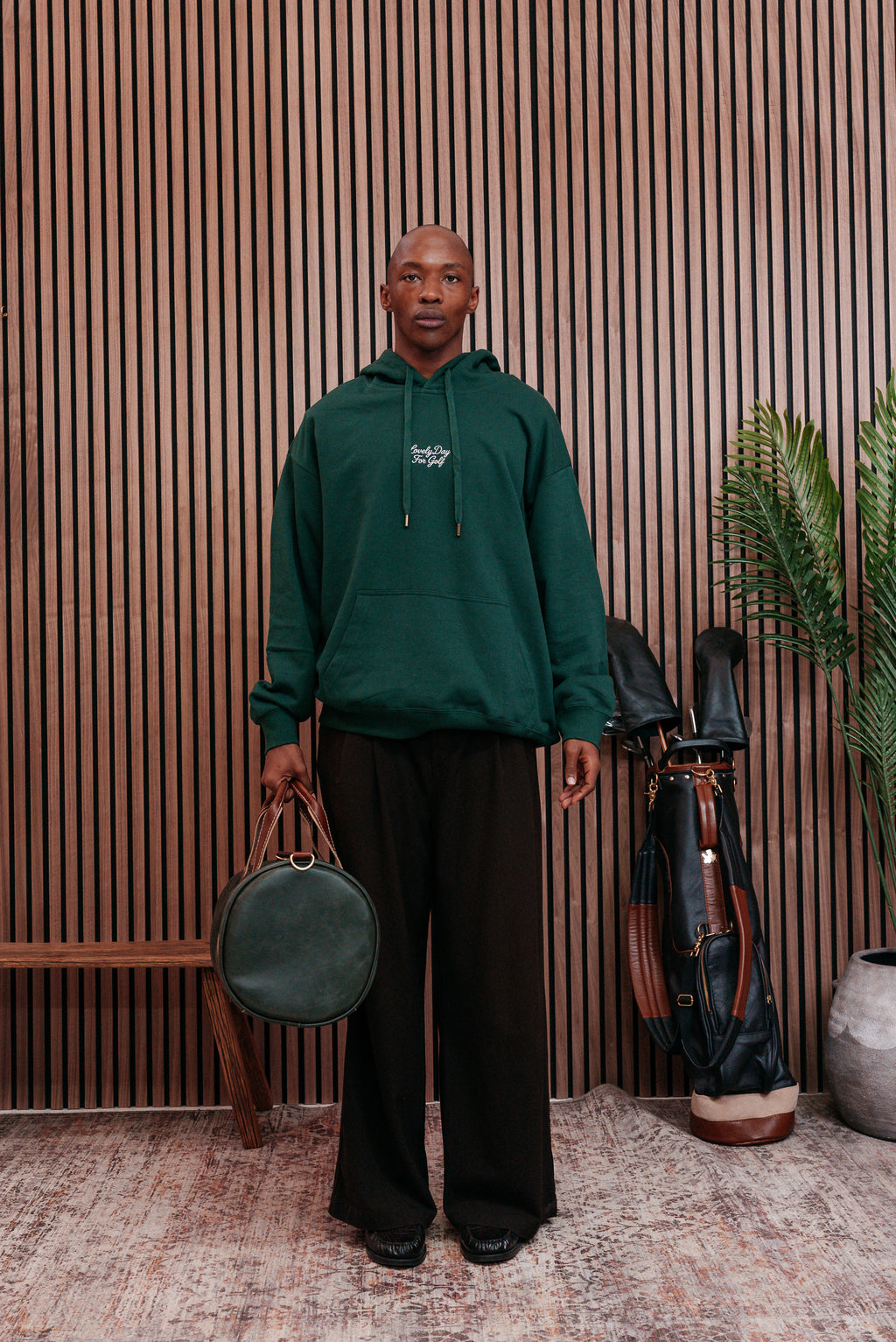 Forest green Lovely Day For Golf hoodie worn front on