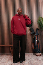 Burgundy Lovely Day For Golf hoodie worn front on